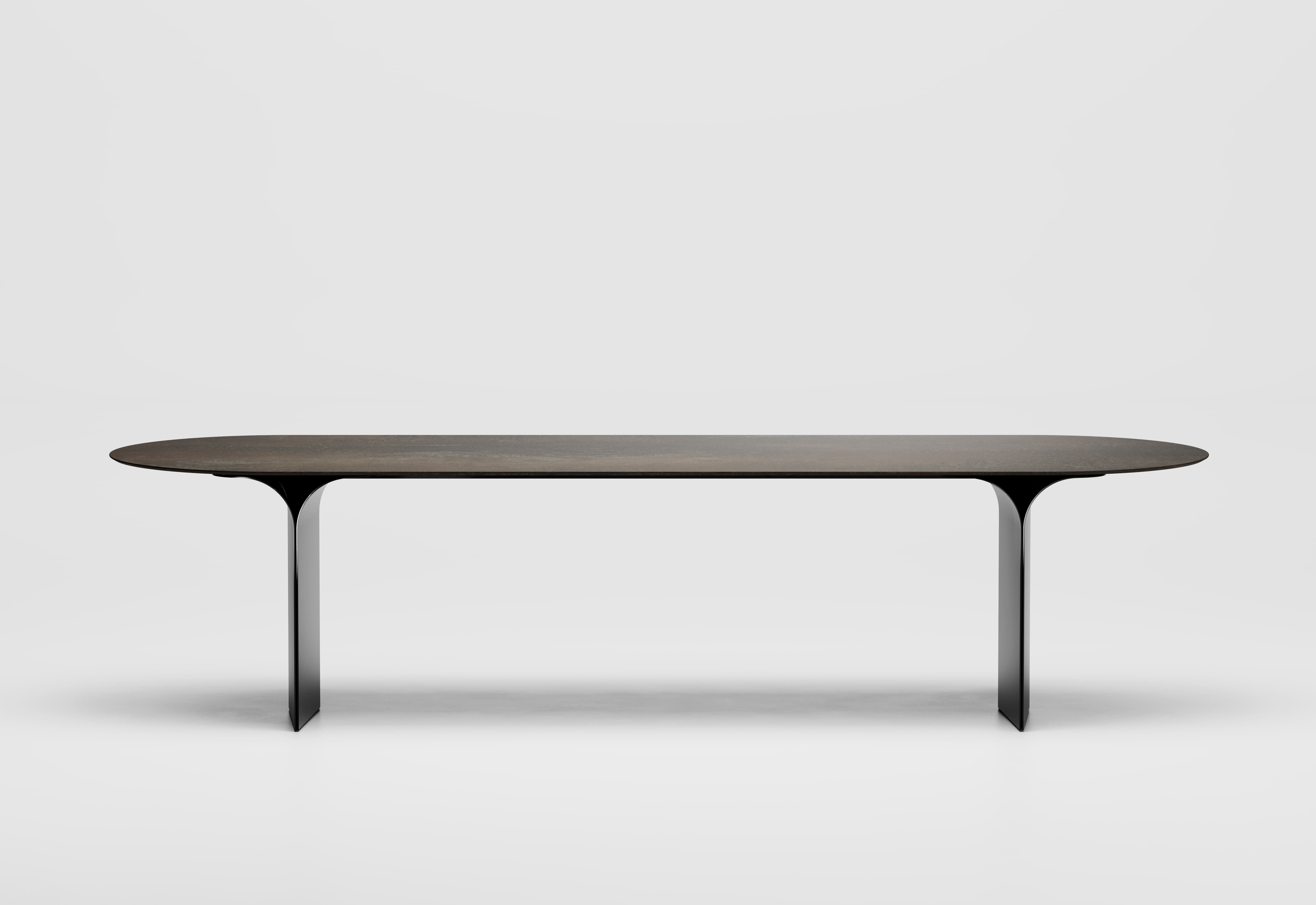 ARCS OVAL DINING TABLE