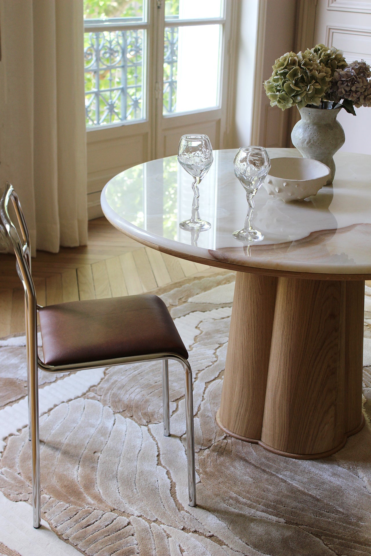 https://cdn.shopify.com/s/files/1/0971/2346/7599/files/marbera-poli-dining-table-wood-honey-4.jpg?v=1768306037