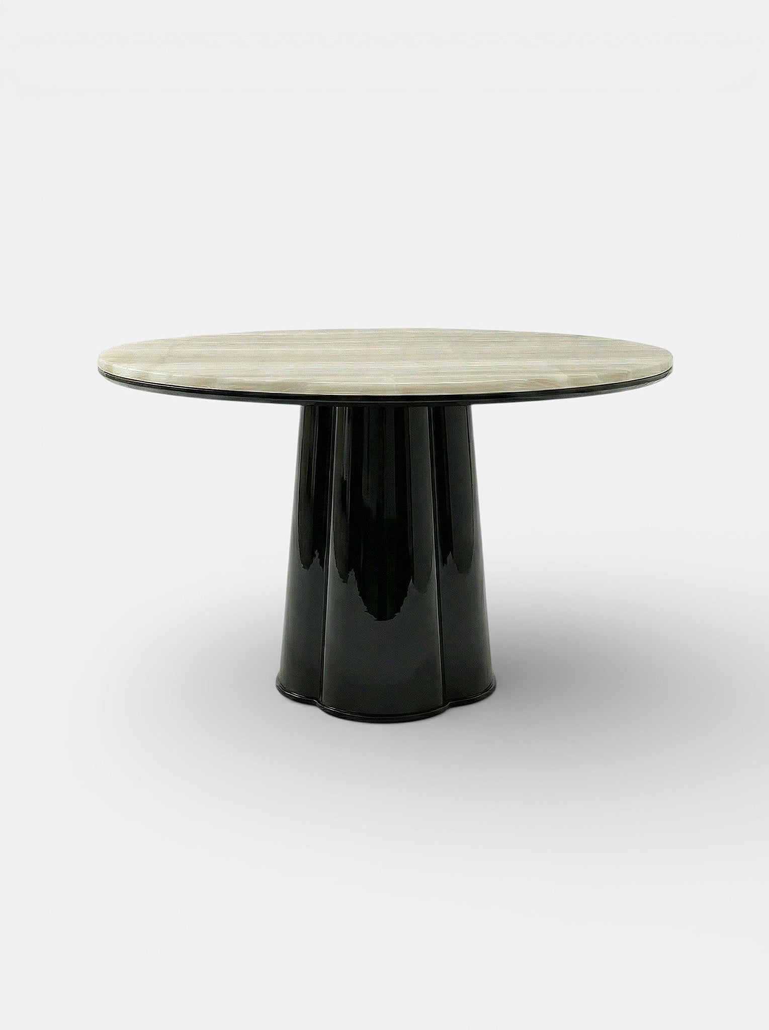 https://cdn.shopify.com/s/files/1/0971/2346/7599/files/poli_black_and_ivory_onyx_2.jpg?v=1770303624